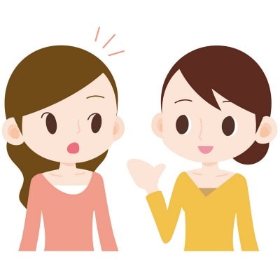 井戸端会議する女性2人