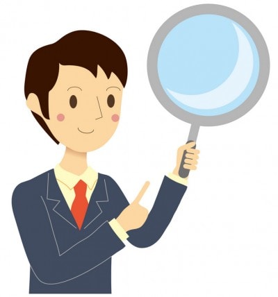 大きなルーペを持つスーツ男性のイラスト